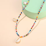 Colorful Beaded Shell Necklace with Handmade Braided Pearl Rice Beads - Gold
